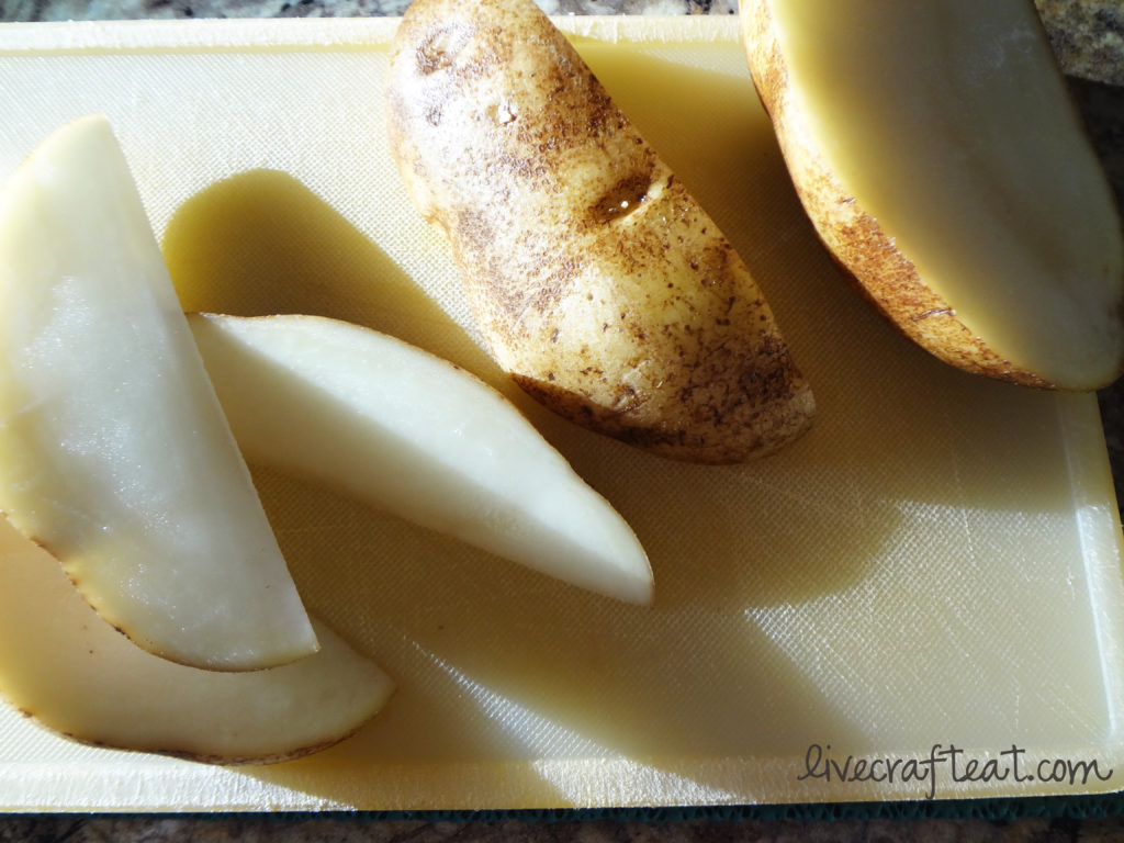 cutting potatoes into wedges