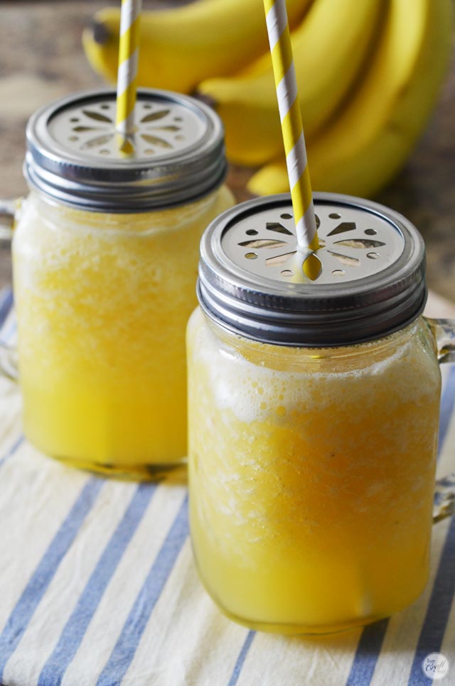 a delicious banana slush punch reminds me of summer. only 5 ingredients to make the slush and it's great to have in the freezer for any occasion!