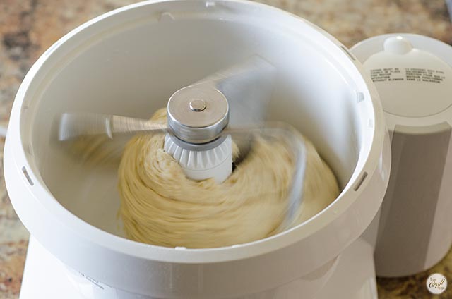 cinnamon roll dough in a stand mixer