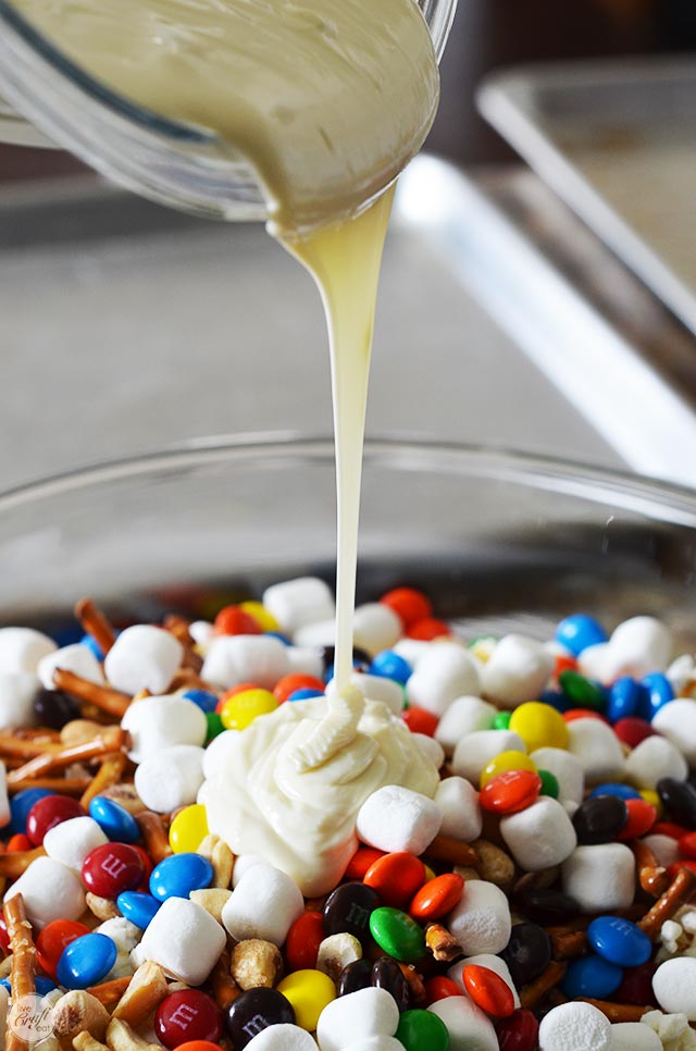 the ultimate bowl of popcorn - candy, marshmallows, pretzels and more mixed with melted white chocolate chips = heaven!