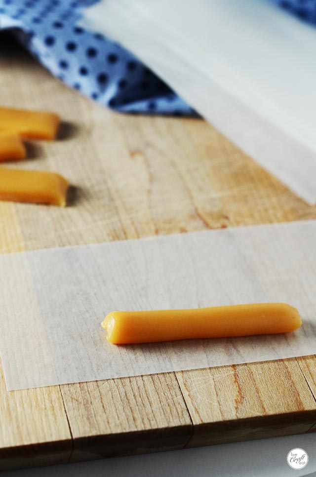 rolling caramel candies to give to friends and neighbors for christmas