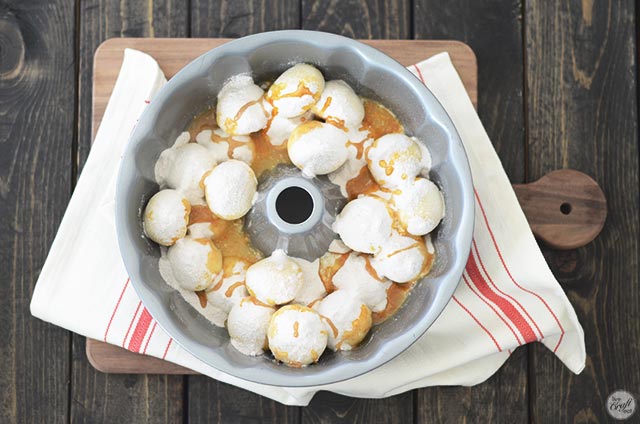 melted butter poured all over monkey bread balls