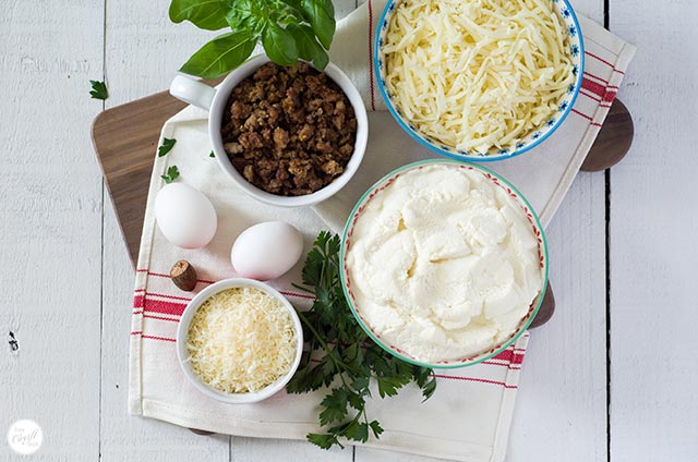 italian sausage, mozzarella, ricotta, parmesan, eggs, parsley, basil, nutmeg